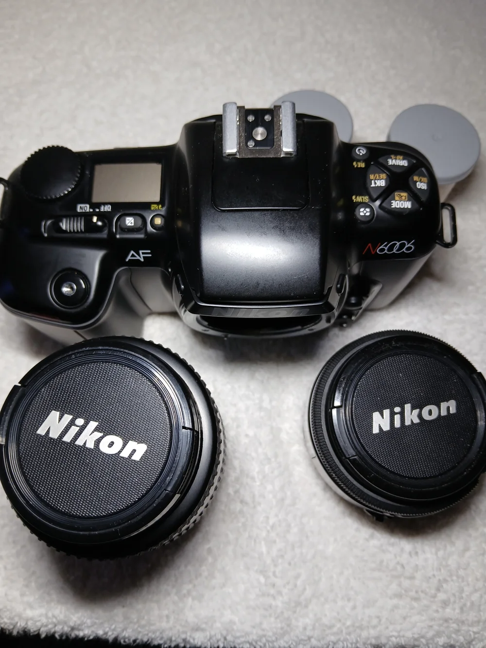 Nikon N6006 35mm autofocus SLR film camera. With Extra Lens and 2 Rolls Of Film.